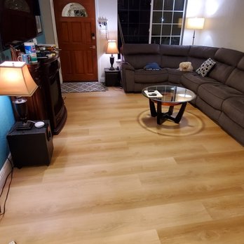 Ralph Opfer Floors - a living room with a couch and a coffee table - Flooring Near Me - Rancho Cordova, California Ralph Opfer Floors - a living room with a couch and a coffee table - Flooring Near Me - Rancho Cordova, California