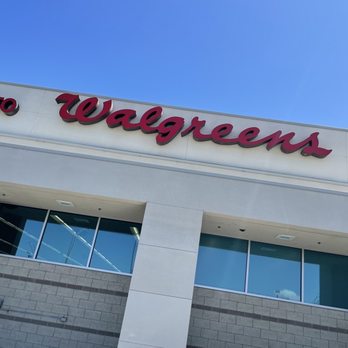 Walgreens - a car parked in front of a walgreens store - Cosmetics & Beauty Supply Near Me - Fresno, California