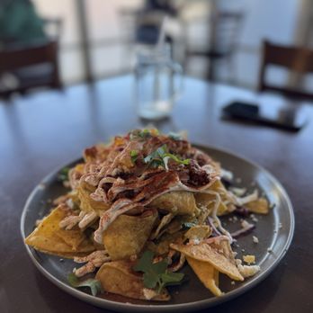 8th Haus Cafe - $13 CHILAQUILES: this was good, chips were crispy! - Breakfast & Brunch Near Me - Anaheim, California 8th Haus Cafe - $13 CHILAQUILES: this was good, chips were crispy! - Breakfast & Brunch Near Me - Anaheim, California