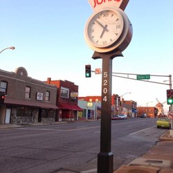 John's Sales & Service - This is the old clock in front of John's. It's a beauty right? And they actually keep it running correctly!