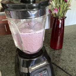 a blender filled with pink liquid