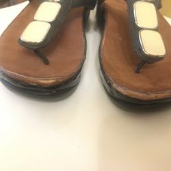 Mike's Shoe Repair - AFTER: Mangled sole with poorly cut piece of leather glued on top.