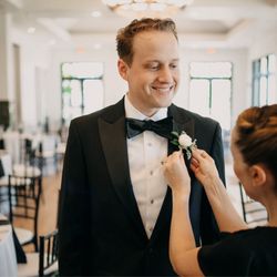 One Sweet Day, Weddings & Events - Courtney putting on my husbands boutonniere