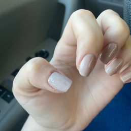 Rather than redoing, she just added another layer of paint over the messed up polish. Didn't even clean the edges. Rather than redoing, she just added another layer of paint over the messed up polish. Didn't even clean the edges.