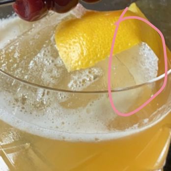Dynamite Woodfire Grill - The Amaretto Sour I was delirvered with Plastic Wrap still in it. - American Near Me - Omaha, Nebraska Dynamite Woodfire Grill - The Amaretto Sour I was delirvered with Plastic Wrap still in it. - American Near Me - Omaha, Nebraska