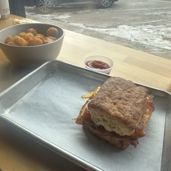 The Biscuit Joint - Papa and side of tots - Breakfast & Brunch Near Me - Saint Louis, Missouri The Biscuit Joint - Papa and side of tots - Breakfast & Brunch Near Me - Saint Louis, Missouri