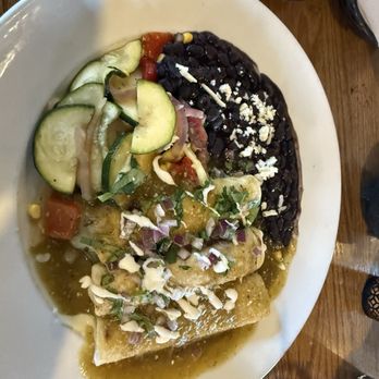 Barrio Queen - Cheese enchiladas smothered in green sauce. Blackbeens and pickled vegetables. - Mexican Near Me - Tempe, Arizona