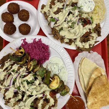 Nazareth Bread - Alexander kabob platters, rice, falafel, pita, slaw, veggie kabob, humus, baba ghanoush, hot sauce, and tzatziki. - Mediterranean Near Me - Greensboro, North Carolina Nazareth Bread - Alexander kabob platters, rice, falafel, pita, slaw, veggie kabob, humus, baba ghanoush, hot sauce, and tzatziki. - Mediterranean Near Me - Greensboro, North Carolina