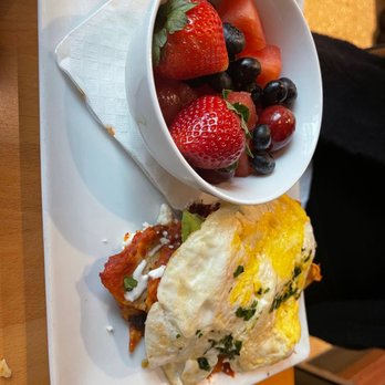 Dime Store - Chef Special: chilaquiles benny with fresh fruit - Breakfast & Brunch Near Me - Detroit, Michigan
