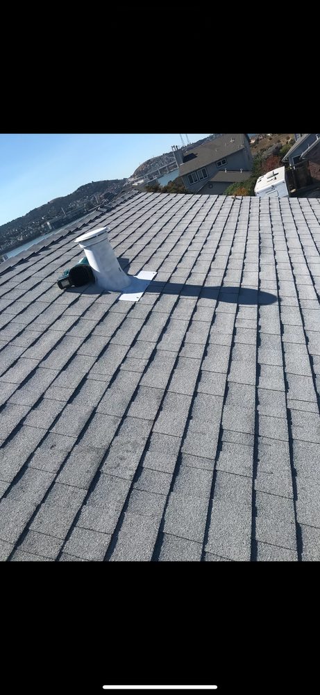 Slide of Zaguilan Roofing Service