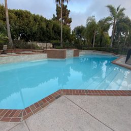 Pool with raised spa and planters behind pool. Pool with raised spa and planters behind pool.