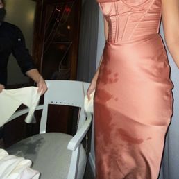 Ariel service spilled drink on the dress