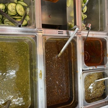 Tacos Y Más - They offer a self serve station with there salas and veggies. - Tacos Near Me - Fontana, California Tacos Y Más - They offer a self serve station with there salas and veggies. - Tacos Near Me - Fontana, California
