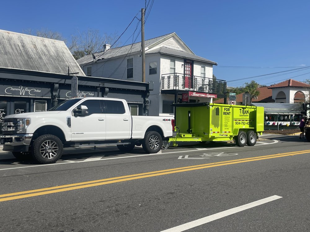 Slide of Titan Dumpsters and Hauling