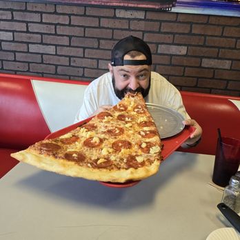 Richie B’s Pizza - Me with the monster slice. - Pizza Near Me - Albuquerque, New Mexico