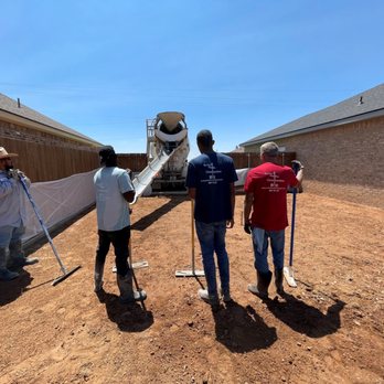 Rocky's Construction - a group of men working on a house - Landscape Architects or Designers Near Me - Lubbock, Texas