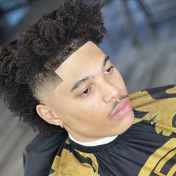 Over The Top Barbershop - Mid- taper w/edge up