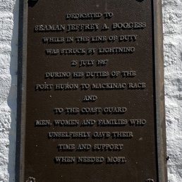 Plaque by the lighthouse door.