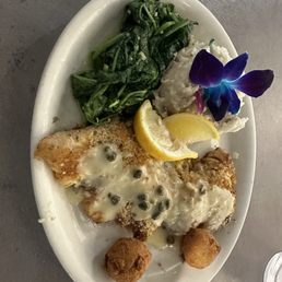 Parmesan crusted grouper, spinach and truffle mashed potatoes.
