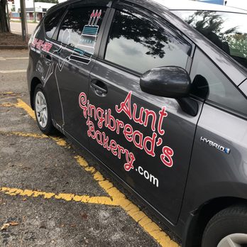 Aunt Gingibread's Bakery - a car parked in a parking lot - Bakeries Near Me - Apopka, Florida