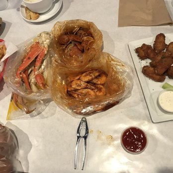 Pirates Kitchen - Snow crab, shrimps, clams, garlic fries, clam chowder, lemon pepper shrimps. - Cajun/Creole Near Me - Artesia, California Pirates Kitchen - Snow crab, shrimps, clams, garlic fries, clam chowder, lemon pepper shrimps. - Cajun/Creole Near Me - Artesia, California