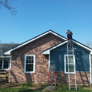 Moyer And More Exteriors - a man on a ladder - General Contractors Near Me Moyer And More Exteriors - a man on a ladder - General Contractors Near Me