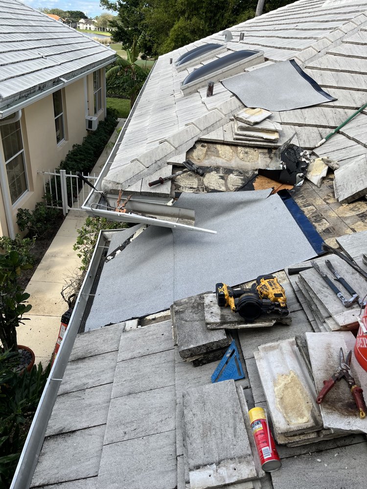 Slide of Francis Roofing Solutions