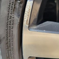 Samson Towing - Visible damage on rim and tire.