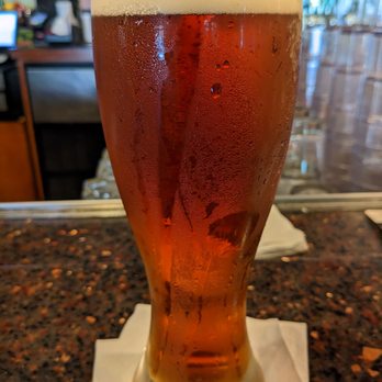 The Local - a glass of beer on a bar - American Near Me - Honolulu, Hawaii The Local - a glass of beer on a bar - American Near Me - Honolulu, Hawaii