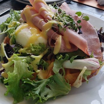 Brussels Bistro - Eggs benedict with ham, hollandaise on the side. - Belgian Near Me - San Clemente, California Brussels Bistro - Eggs benedict with ham, hollandaise on the side. - Belgian Near Me - San Clemente, California