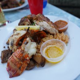 a plate of seafood and rice
