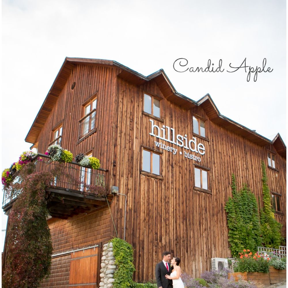 Hillside Winery - bride and groom standing in front of the winery - Wineries Near Me - Penticton, British Columbia