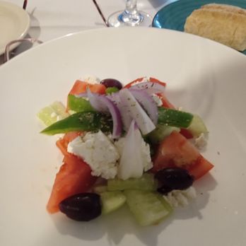 Santorini - Greek salad $12.95 not all of the portion are this small. - Mediterranean Near Me - Wildwood, New Jersey Santorini - Greek salad $12.95 not all of the portion are this small. - Mediterranean Near Me - Wildwood, New Jersey