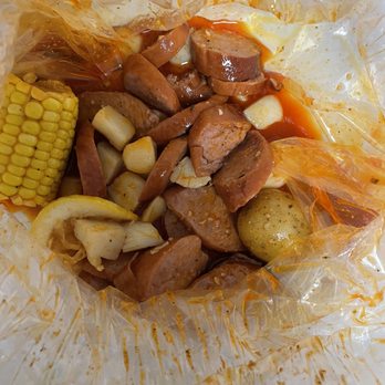 Aloha Krab Cajun Seafood & Bar - Not 1/2 pd of scallops. The picture is obvious that the sausage are 1/2 pd & there are less than half of those pearl scallop that weigh less - Seafood Near Me - Union, New Jersey