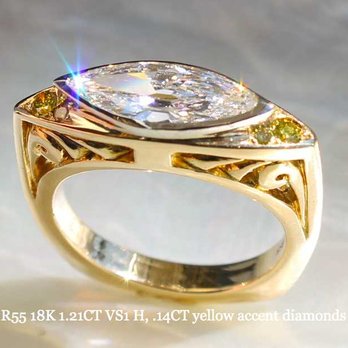 John David Cooney - Hand carved ring, in 18K with yellow diamond accents and a nice big Marquee Diamond. For sale! - Jewelry Near Me - Stuart, Florida John David Cooney - Hand carved ring, in 18K with yellow diamond accents and a nice big Marquee Diamond. For sale! - Jewelry Near Me - Stuart, Florida