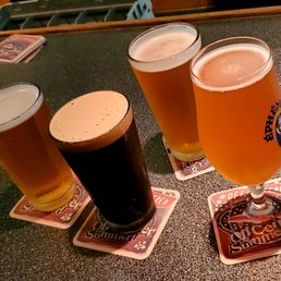 Our Round of four beers: Total was $31 including tip Our Round of four beers: Total was $31 including tip