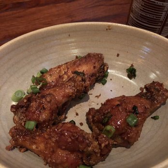 Tavern Hall - Tavern wings in sesame sauce? Comes with bottle of sriracha. Bomb ass good! - New American Near Me - Bellevue, Washington Tavern Hall - Tavern wings in sesame sauce? Comes with bottle of sriracha. Bomb ass good! - New American Near Me - Bellevue, Washington