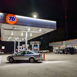 76 - Outside. Gas station and convenience store. This 76 has 6 gas pumps.