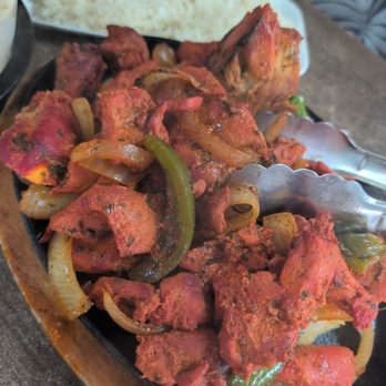 Babu Tikka Masala - Tandoori chicken! Hot and steamy!  Rice in the background. - Indian Near Me - Cottonwood, Arizona