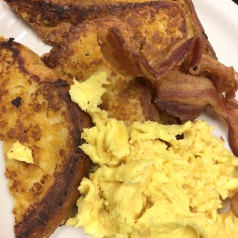 Bagelmania - Krispy Challah French Toast combo with 2 scrambled eggs and bacon! - Bagels Near Me - Sunrise, Florida