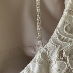 Executive Tailoring & Embroidery - Straps shortened so tight that after extending straps out she had to re-add beading that doesn't match.
