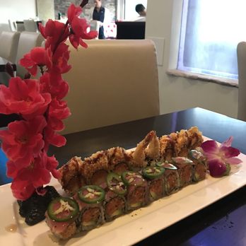 Izu Sushi - Spicy girl on far left and crazy tuna roll on right! - Japanese Near Me - Denver, Colorado Izu Sushi - Spicy girl on far left and crazy tuna roll on right! - Japanese Near Me - Denver, Colorado
