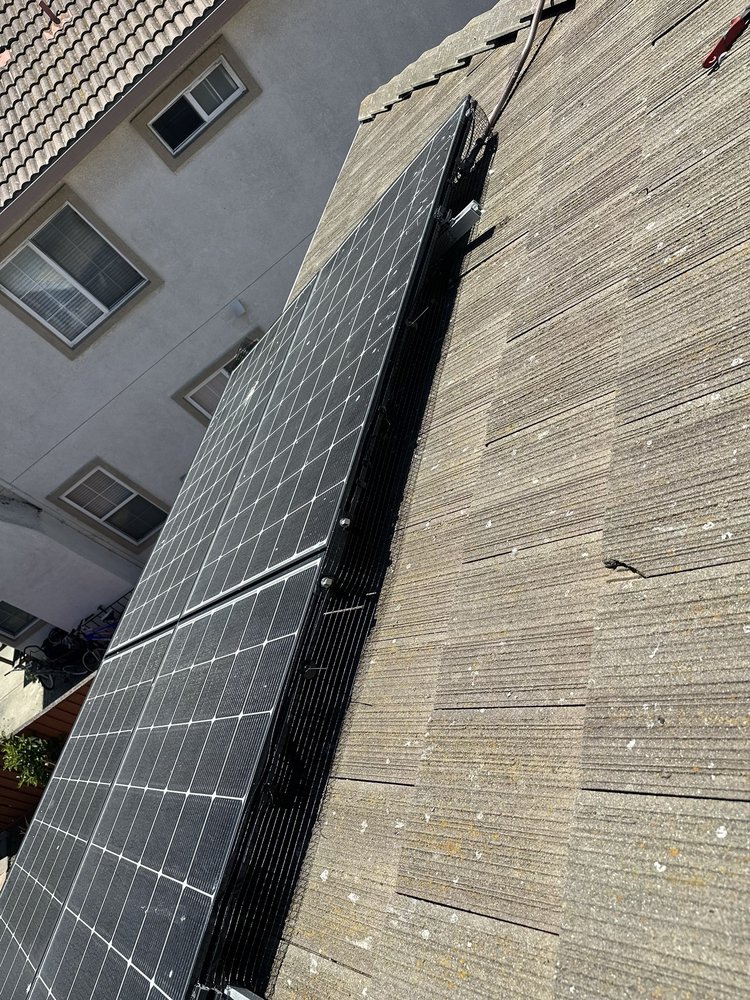 Slide of LAAC Roofing Services