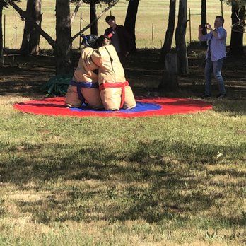 A & E Air Jumpers - Family sumo match - Bounce House Rentals Near Me