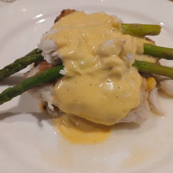 PIER 22 - Grouper Oscar with crab meat over corn risotto and topped with asparagus spears - New American Near Me - Bradenton, Florida PIER 22 - Grouper Oscar with crab meat over corn risotto and topped with asparagus spears - New American Near Me - Bradenton, Florida