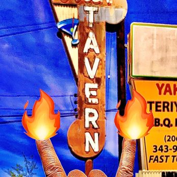The Siren Tavern - a hand holding up a sign - Cocktail Bars Near Me - Seattle, Washington The Siren Tavern - a hand holding up a sign - Cocktail Bars Near Me - Seattle, Washington