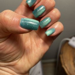 Gorgeous!  The way the light hits my nails is like the sparkling ocean water!