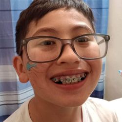 Darnall Charter School - My son after the winter festival. He was so happy and tried to convince me to let him leave his face painting on for school the next day.