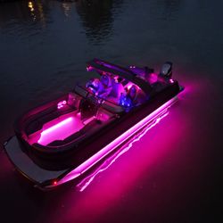 Adventure  Marine & Powersports - Viaggio Diamante at night on the water, commanding attention and turning heads. This Luxury vessel is the talk of the marina.