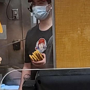 Wendy's - Wait... dang it... I ordered a chicken sandwich... one of those patties in his bare hand is mine... - Fast Food Near Me - Lebanon, Pennsylvania